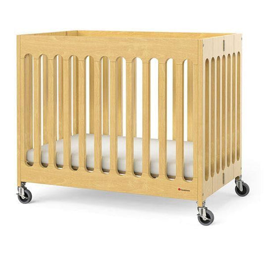 Foundations Wooden Boutique Compact Folding Baby Crib OM+ to 25 Kg L 101.6 x W 63.5  x H 88.9 cm, Includes 3" Infapure Foam Mattress, 4 Commercial Castors for Easy Transport, Color Natural