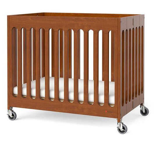 Foundations Wooden Boutique Compact Folding Baby Crib OM+ to 25 Kg, L 101.6 x W 63.5  x H 88.9 cm, Includes 3" Infapure Foam Mattress, 4 Commercial Castors for Easy Transport, Color Cherry